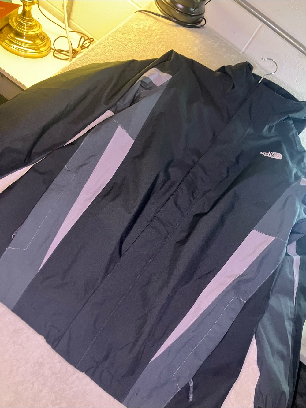 The North Face Boy’s Black and Purple Raincoat with Hood
